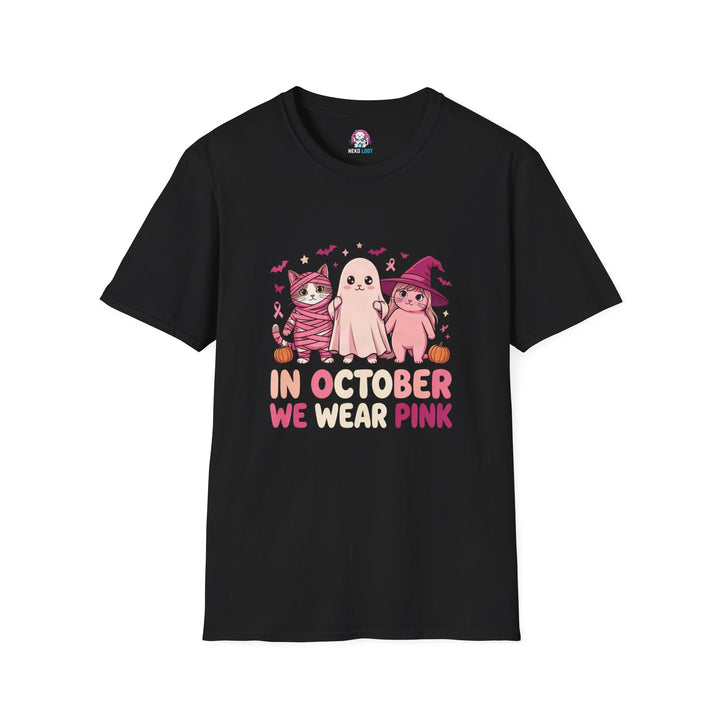 Black T-shirt with pink Halloween characters and In October We Wear Pink lettering.