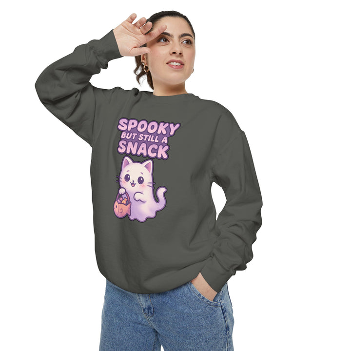 Spooky Snack Sweatshirt Featuring a Cute Ghost Cat Holding a Candy Basket with a Humorous Slogan