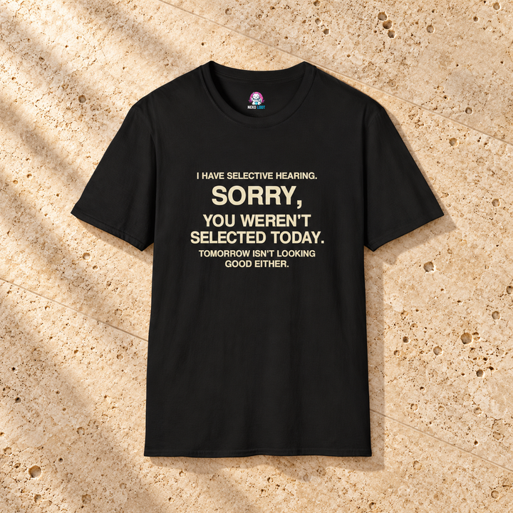 Selective Hearing Sorry Not Selected T-Shirt — black shirt on beige travertine
