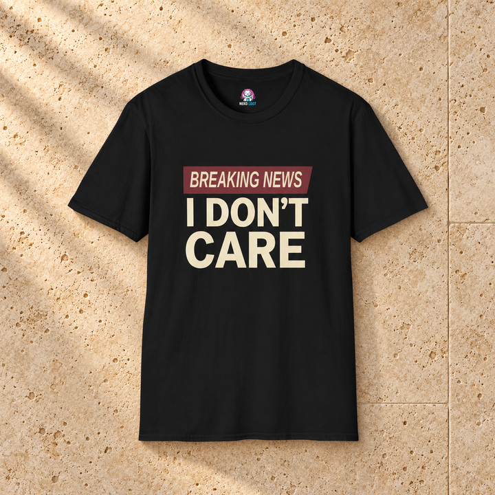 Breaking News I Do Not Care T-Shirt — black shirt on beige travertine