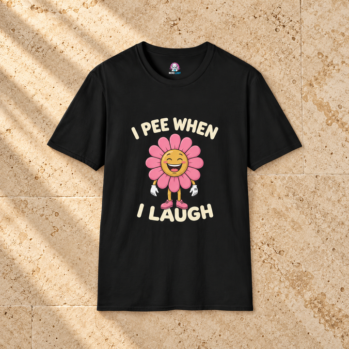 I Pee When I Laugh Flower T-Shirt — black shirt on beige travertine