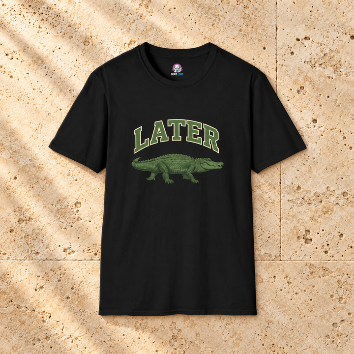 Later Alligator T-Shirt — black shirt on warm beige travertine