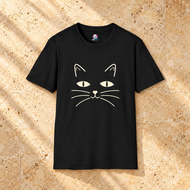 Minimal Cat Face T-Shirt — black shirt on warm beige travertine