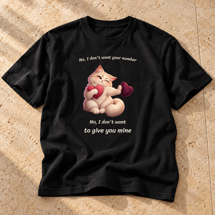 Black Personal Space Refund Cat T-Shirt on warm travertine stone.