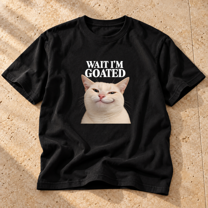 Black Goated cat portrait Cat T-Shirt on warm travertine stone.