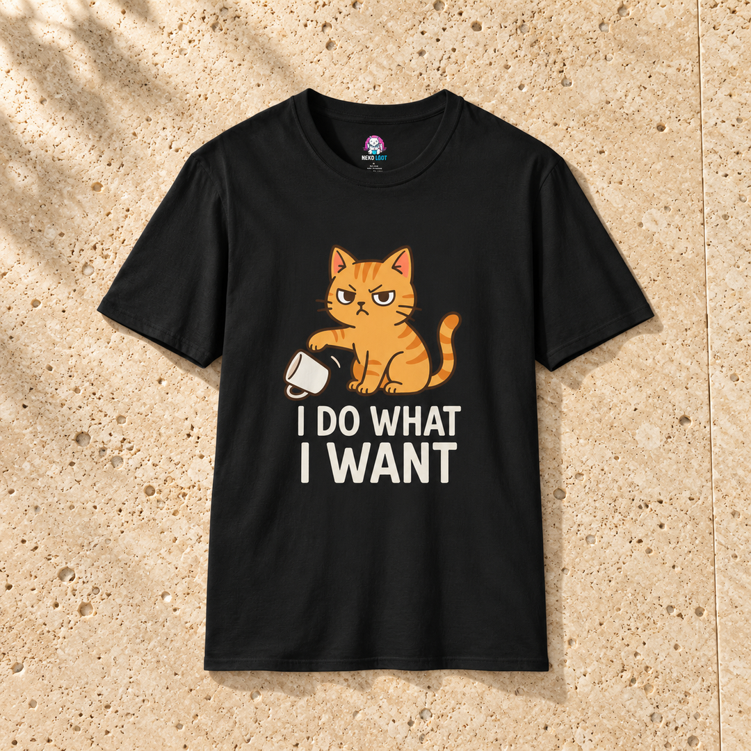 Black Do What I Want Cat T-Shirt on warm travertine stone.
