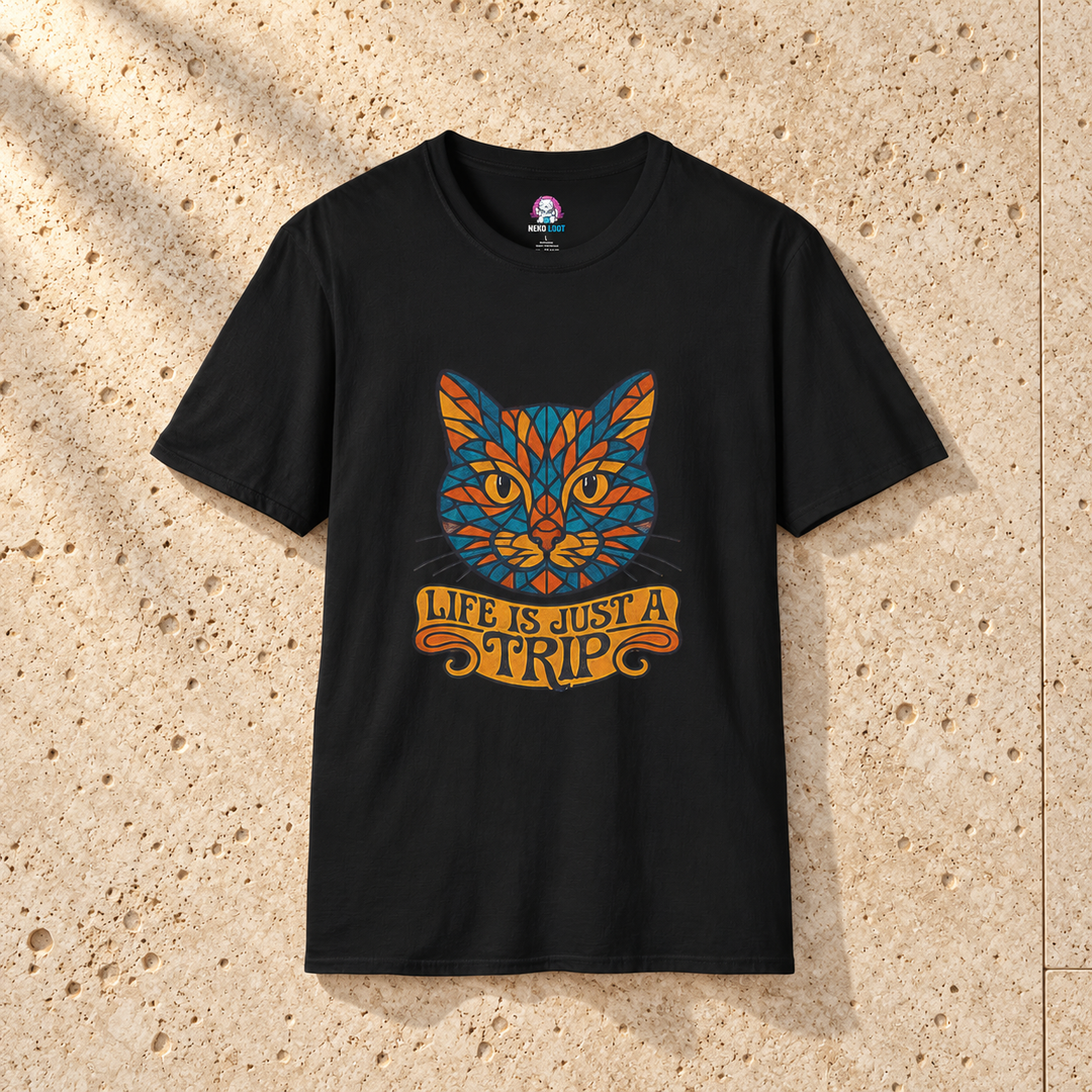 Black Mandala Cat T-shirt on warm travertine stone.