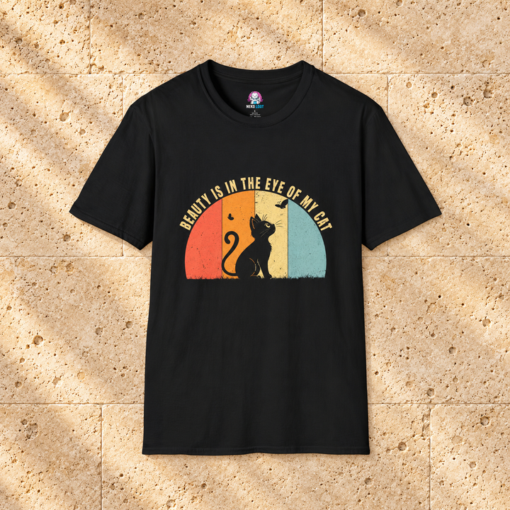 Black Beauty is in the Eye of My Cat T-Shirt on warm travertine stone.